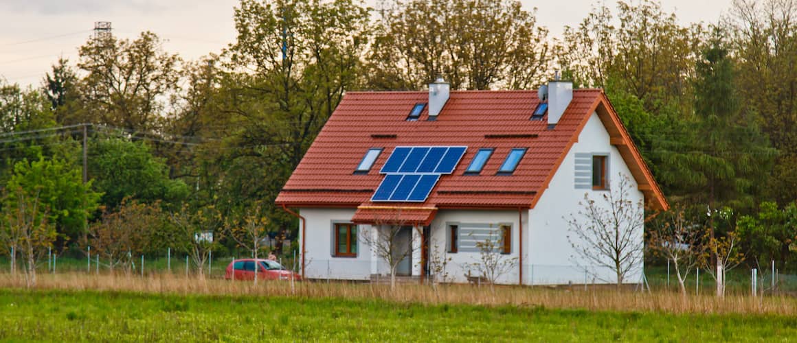 Cute house with solar panels.